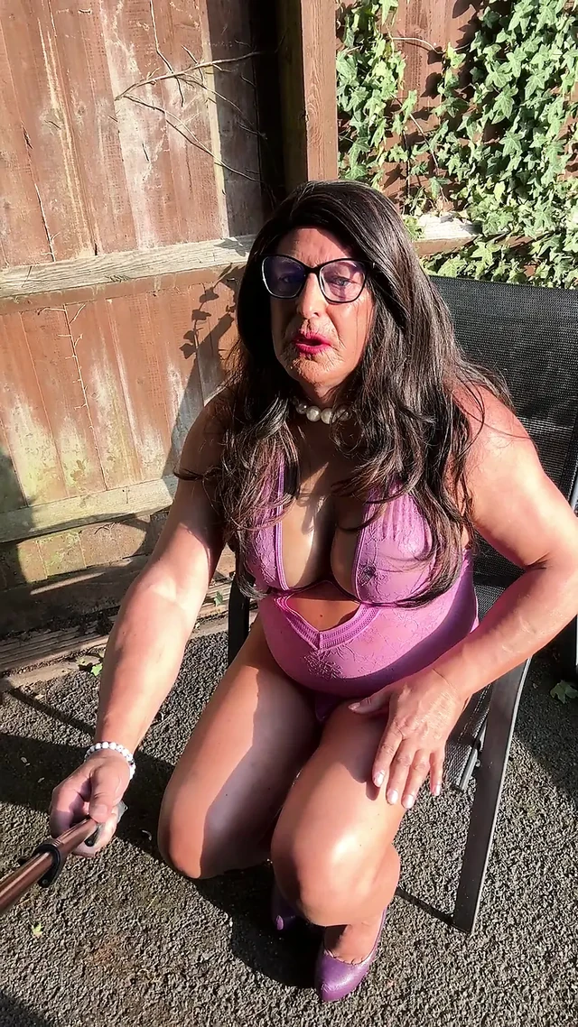 Sexy Crossdresser Kellycd2022 in purple sexy bodysuit and heels