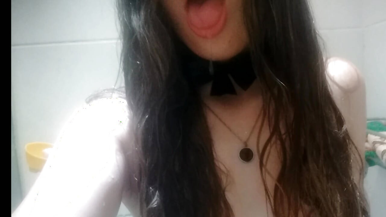 Hot teen taking shower wearing a white lingerie