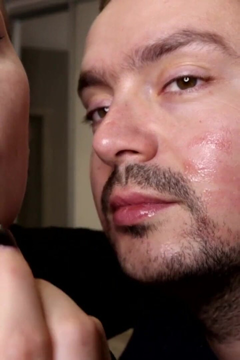 Covering Alex with glossy and red lipsticks kisses all over his face!