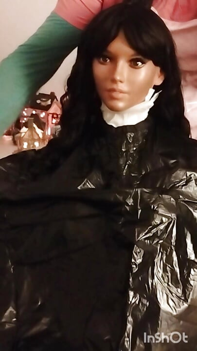 Ebony Sex doll Nikki shows off vinyl shampoo capes