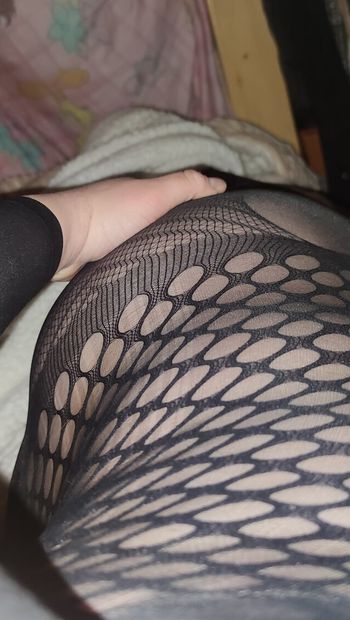 enjoying my new fishnet tights in my room (next door are my parents)