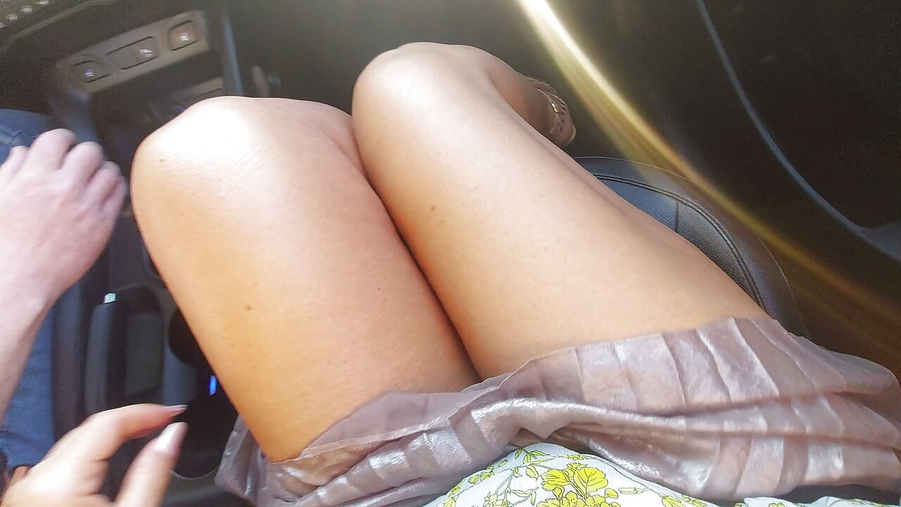 An elegant mature lady with beautiful legs in high heels seduces a taxi driver in the morning