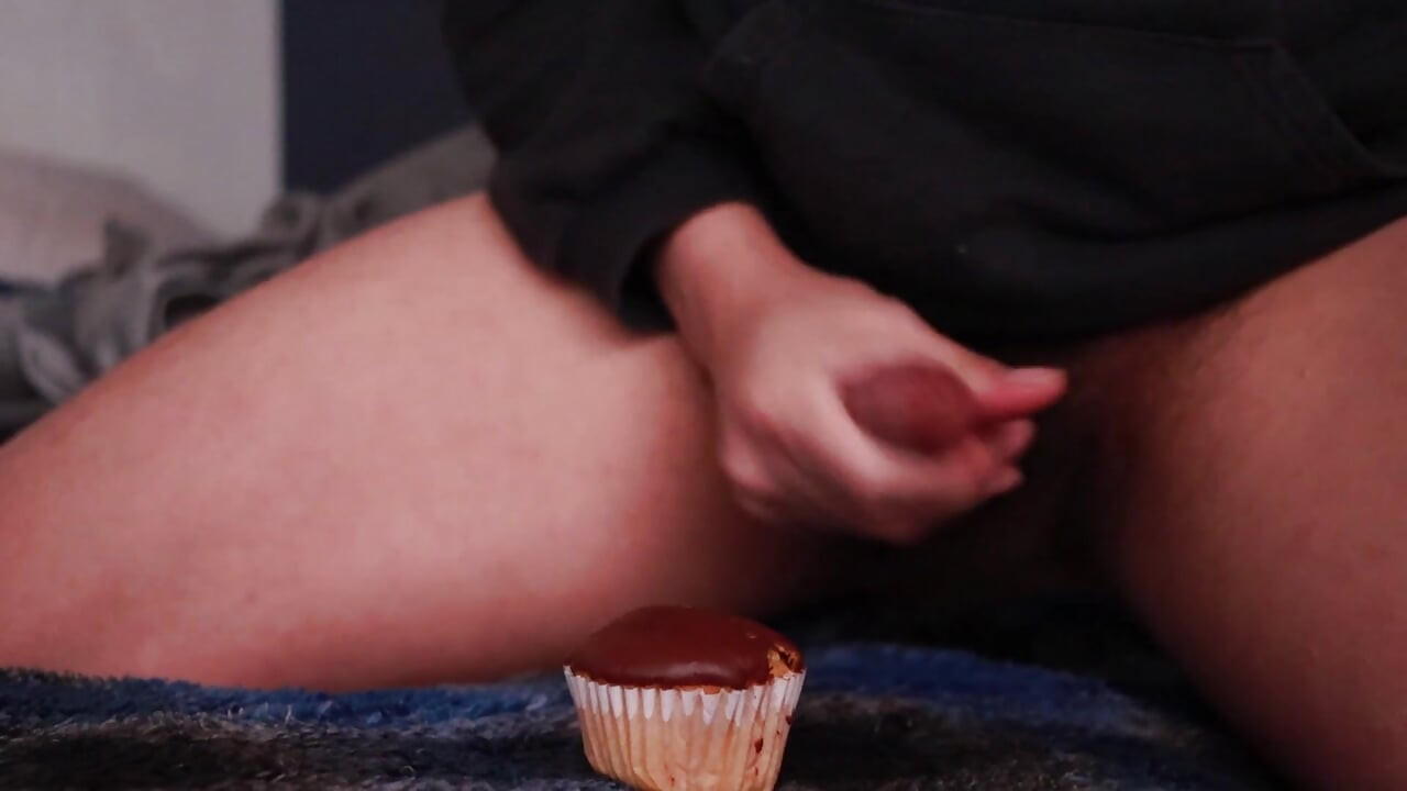 covering a cupcake with cum