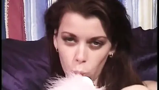 Young brunette with great eyes sucks dude's big cock and swallows a load on the sofa