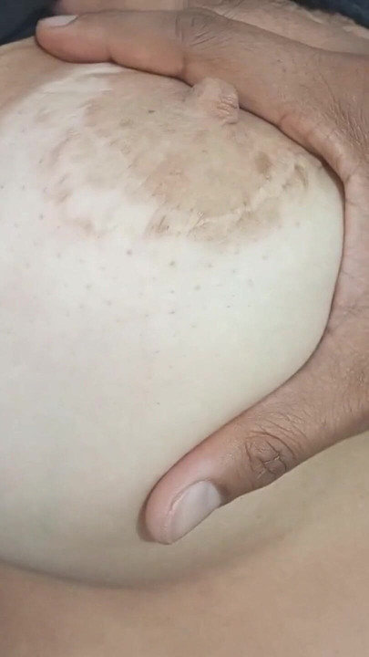 Naughty mom relaxes in bed while her stepson plays with her huge tits and fat ass. | Clip 1