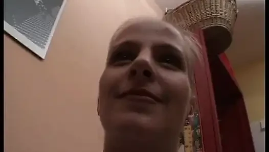 Horny blonde fucks her pierced cunt with a massive dildo