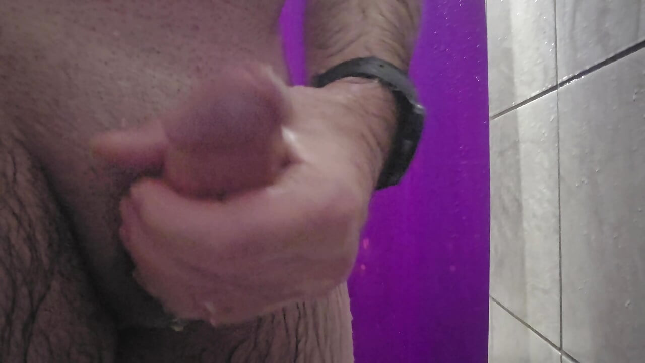 Solo jerk in public gym shower.