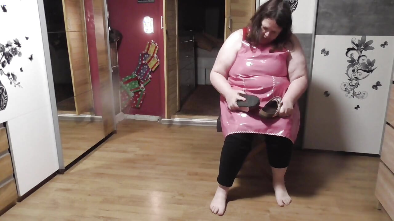 In the Rubber Apron I Flatten the Slippers