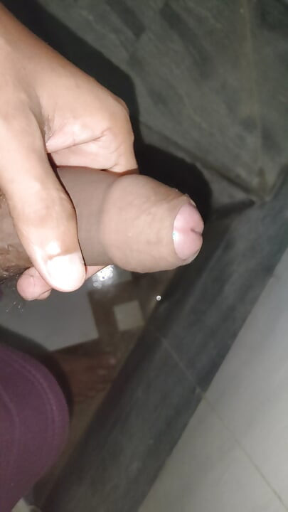 Man masturbating in bathroom