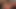 男性が大きな胸の赤毛ミルフにキスしながらカウガールの体位で彼女の膣を掘りつつ