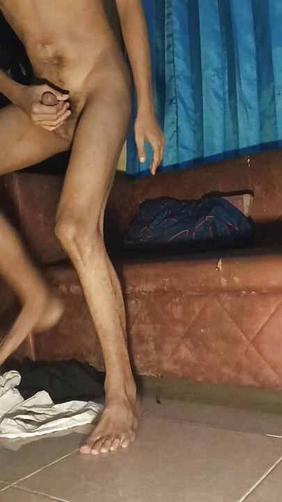 A young man masturbates to an erection