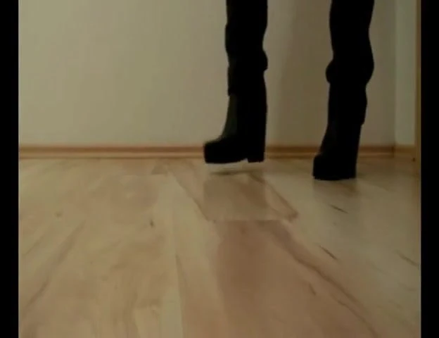 Wanking in cool tall heeled boots and tight leather