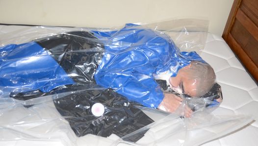 Dec 4 2022 – Vacuum sealed with my PVC Overalls in slvrbrboy1s blue PVC coveralls