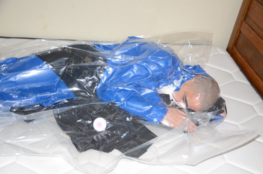 Dec 4 2022 – Vacuum sealed with my PVC Overalls in slvrbrboy1s blue PVC coveralls