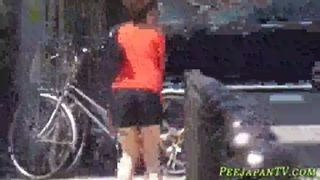 Bizarre Asian whore pees in car park