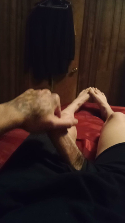 Me stroking my cock showing my long legs and feet
