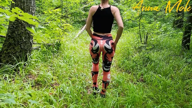 Public masturbation, a girl in leggings walks in nature
