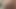 濡れた女の子がシャワーで自分の体を撫でる