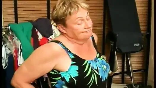 A big granny puts a cock in her mouth and jerks a guy off