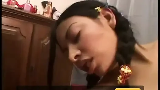 Young Latina in pigtails licks a candy while getting pounded doggy style by stud