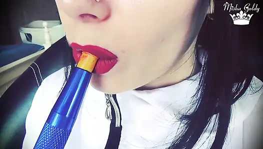 Smoke from dark red big lips