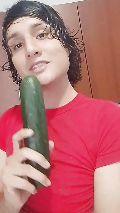 Beautiful femboy arrives at his house excited and decides to smear his body with oil and play with a cucumber