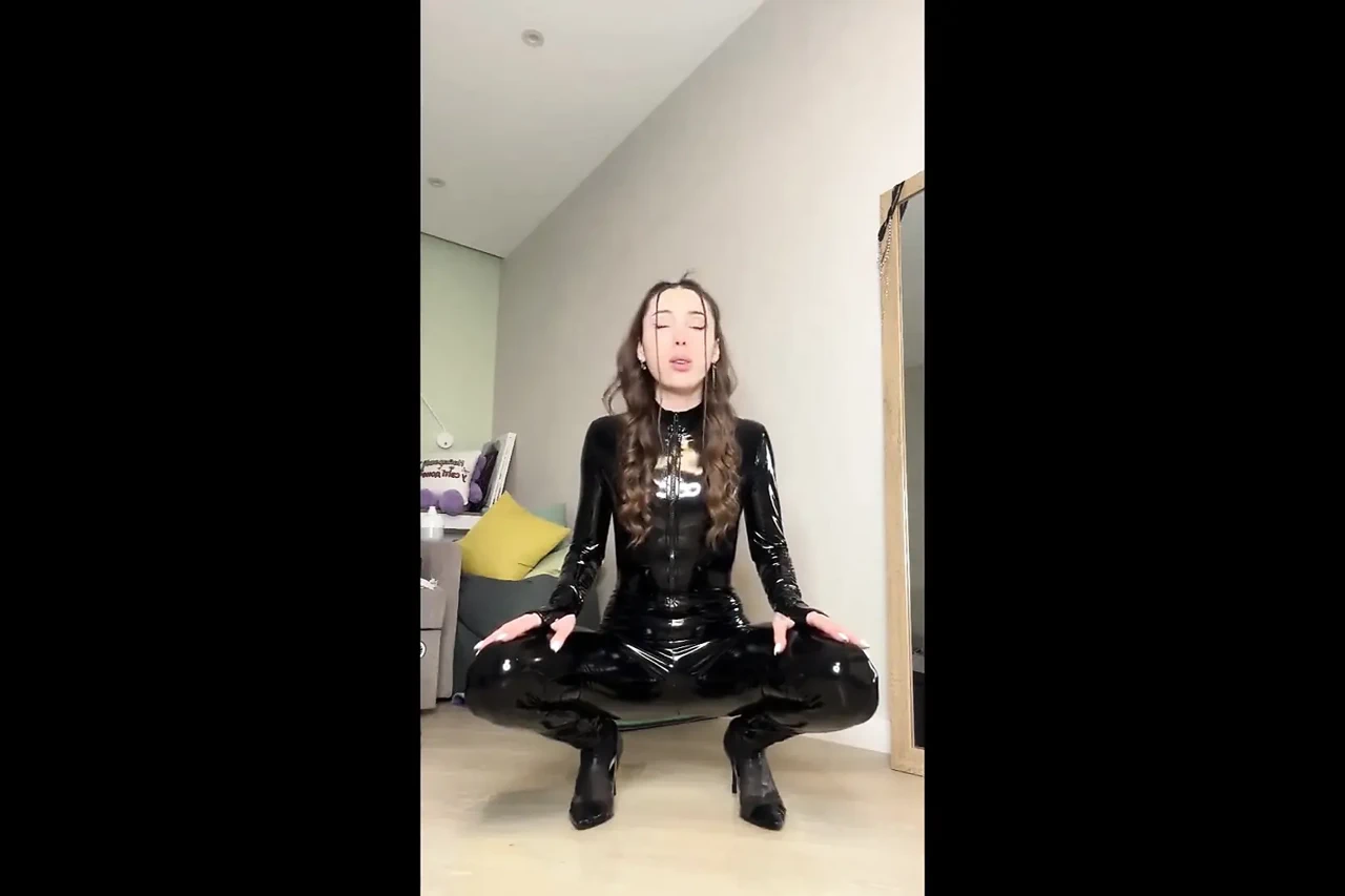 Desperate Pissing in Latex Catsuit & Heels