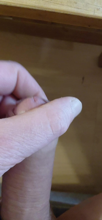 Stroking the penis