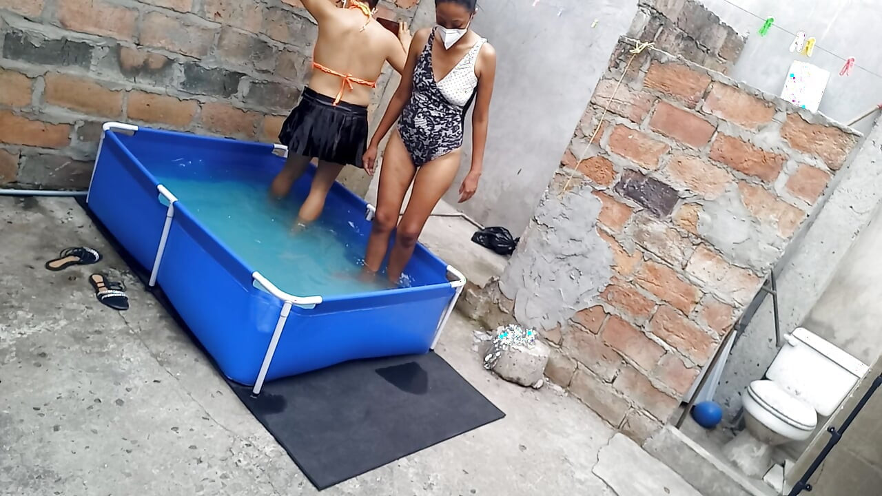 My neighbor is in the pool wearing a very tempting and sexy bikini. She's hot.