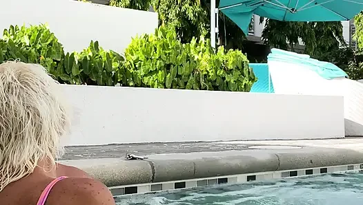 Getting frisky in the hot tub. Boob play.