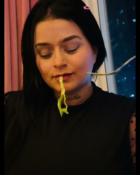 Latina and hot eating in an extremely delightful way