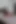 Pvc etekli ve külotlu çoraplı seksi kızıl saçlı poz