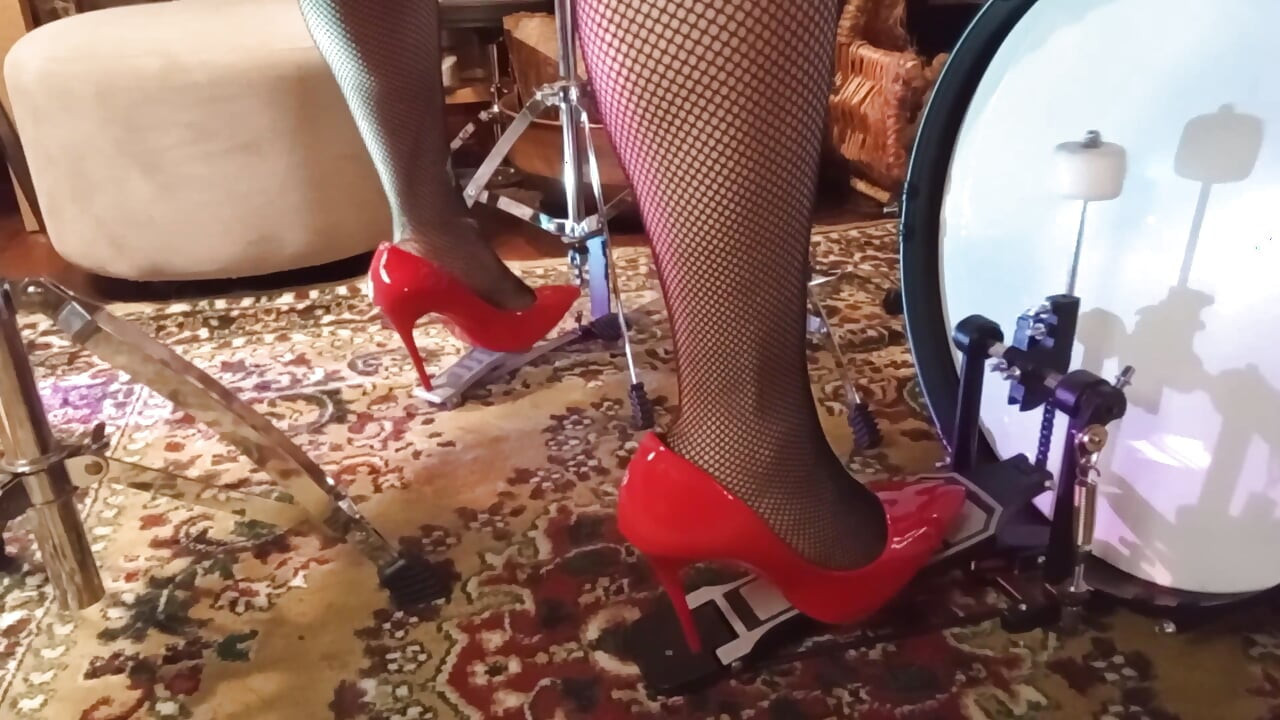 I Play Drums with My New Red Stilleto