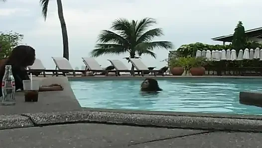 2 sexy Latina's presenting latex fetish in the pool and on the beach