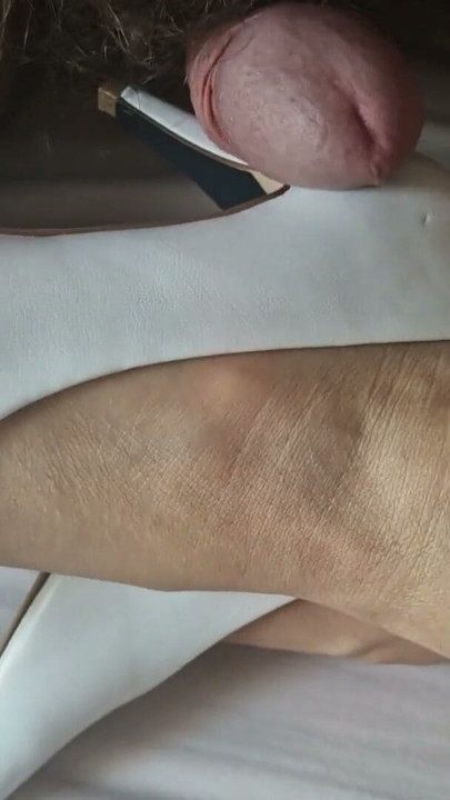 There’s something irresistible about the elegance of a classic white heel in 36 | Clip 1