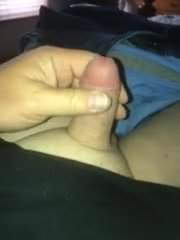 Two finger tugging on my tiny cock