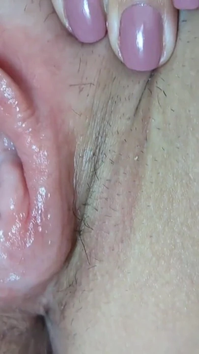 Stunning moment from "Close up sextape of horny french milf wife's pumped wet pussy - watch her touch her swollen lips and"