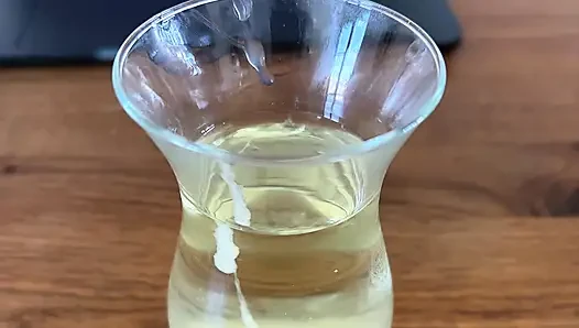 Jerk in a glas of piss and cum drink the Mix