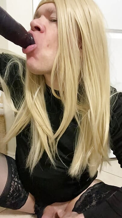 Crossdresser sucking a BBC dildo while talking to Daddy like a good slut
