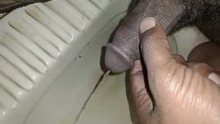 Indian men pissing