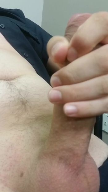 Bored 18-Year-old security guard jerks off his big uncut teen cock at work
