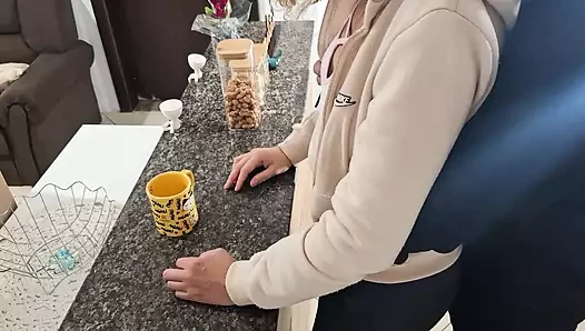 A stepdaughter is surprised while having breakfast.