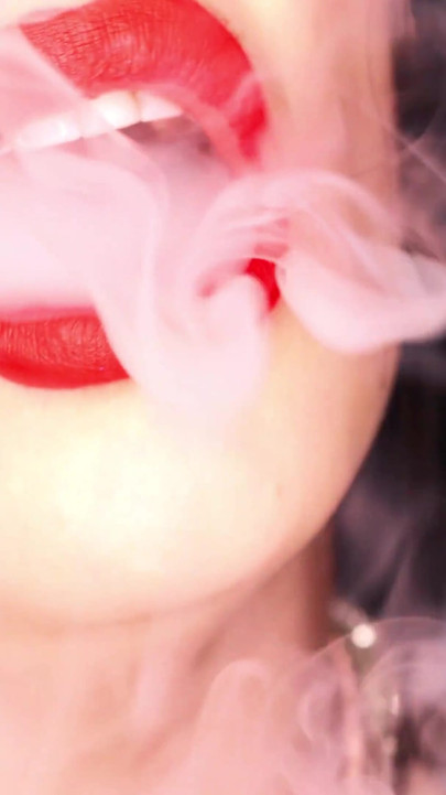 4K Applying red lipstick and smoking hookah on black background