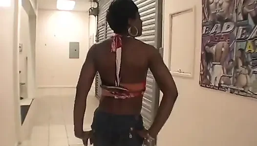Slender black slut gets her cunt licked by a dude in an office