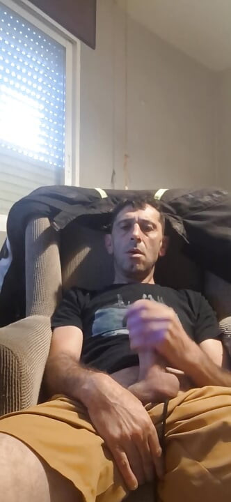 Guy masturbating on the sofa