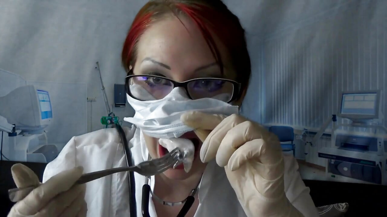 Doctor eating in medical mask and gloves