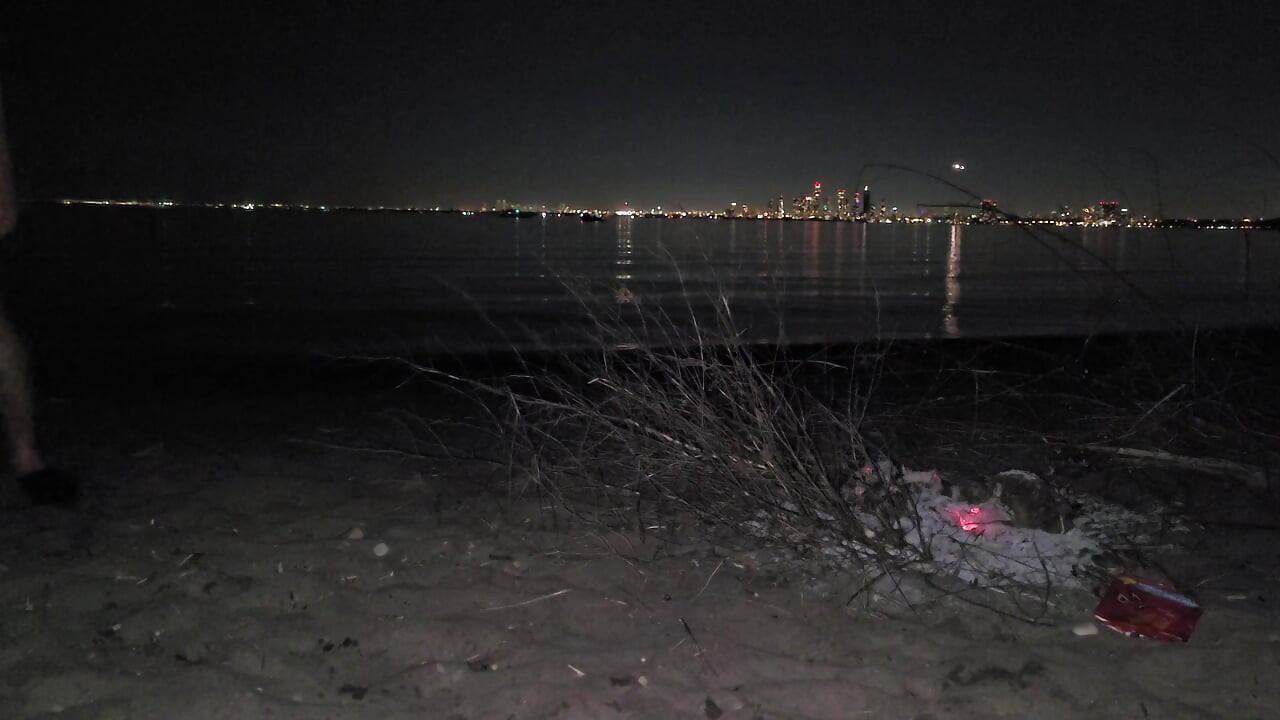 oiled masturbating and piss on the nude beach at night