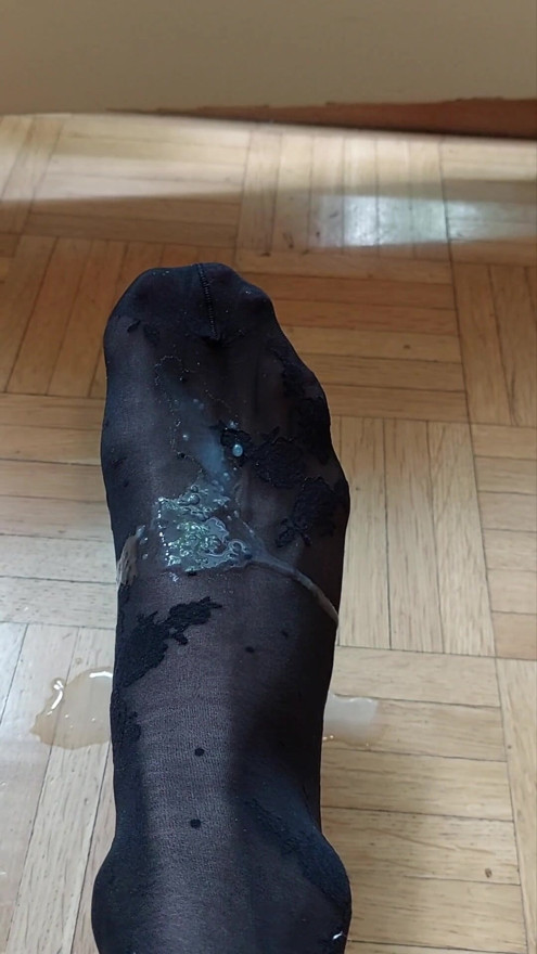 My own cum on my foot.