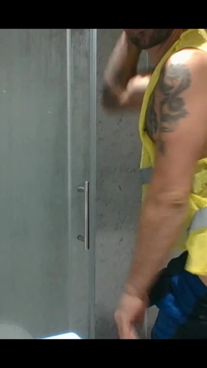 Stunning moment from "Carl working in his filthy hi vis workwear give us a  nice cum shot in the shower"