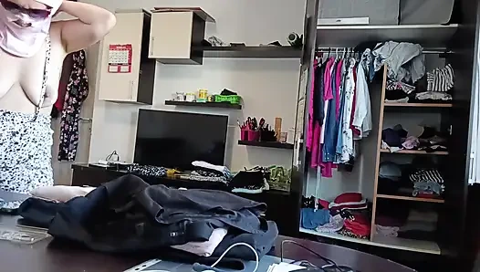 Amateur Woman Has Fun Trying on Clothes and Cutting Them.